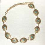 cinto-dourado-oval-turquesas